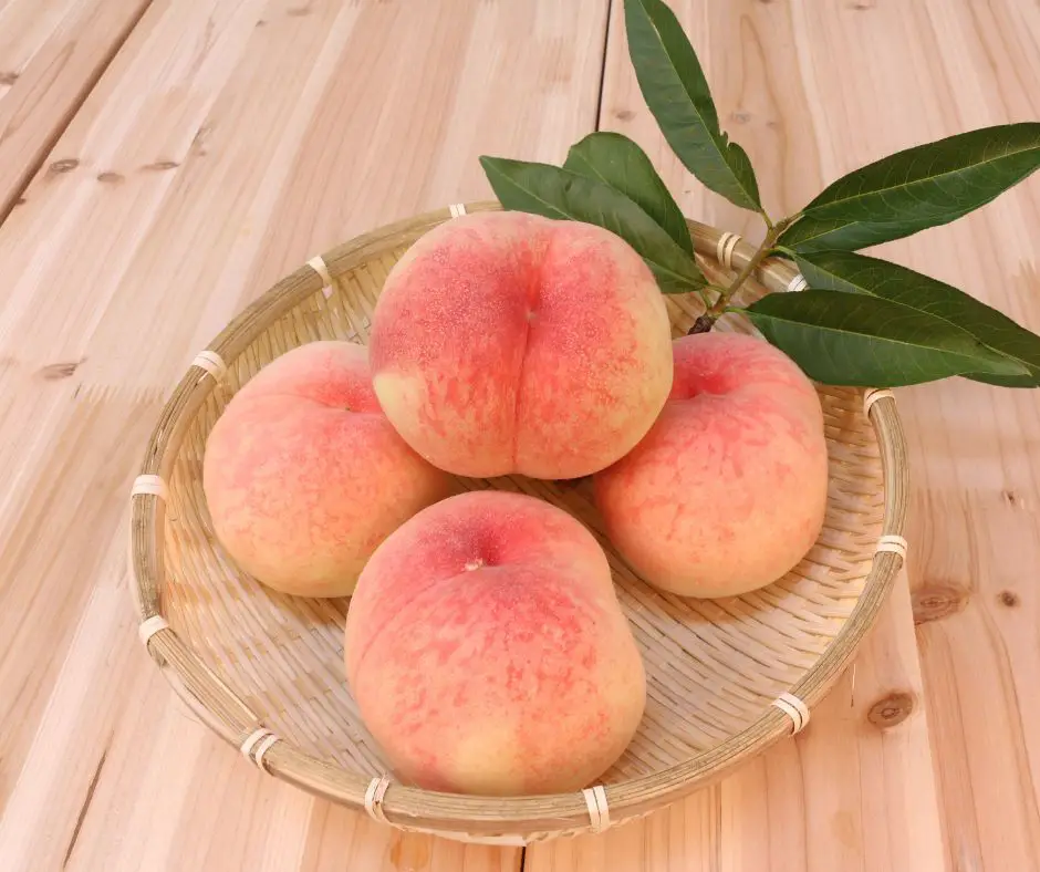 peaches in a bamboo basket