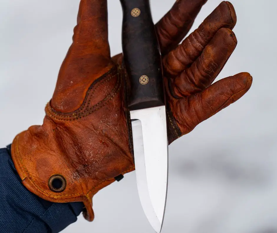 bushcraft knives and leather gloves